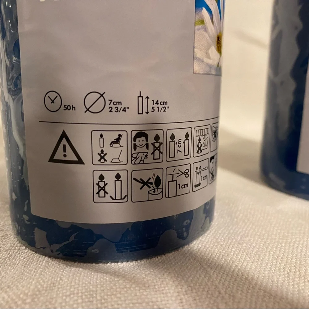 Set of two IKEA scented blue pillar candles 5 1/2 inches - new in pkg 50 hr burn